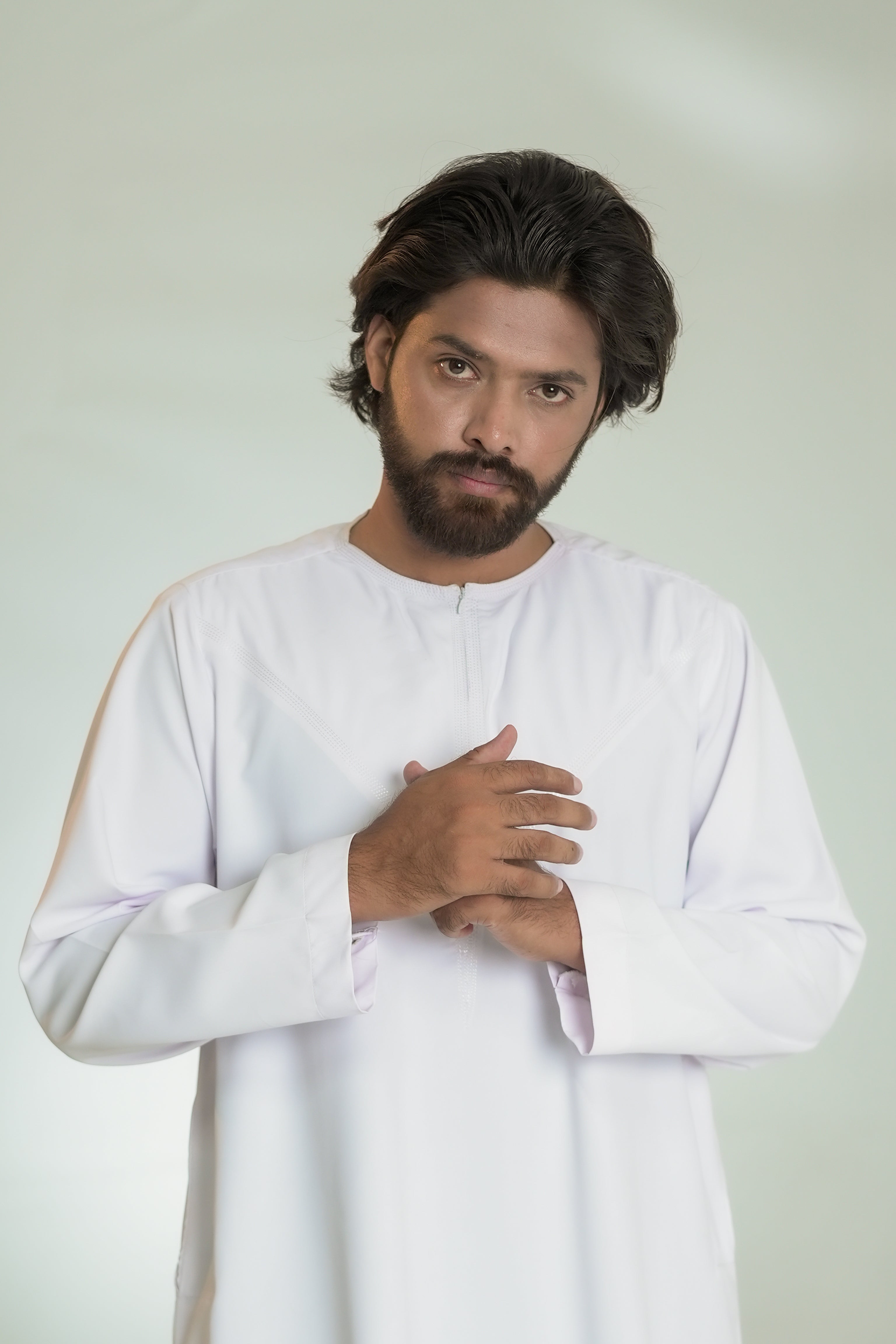 Model wearing IMAN APPAREL Saudi White Jubbah